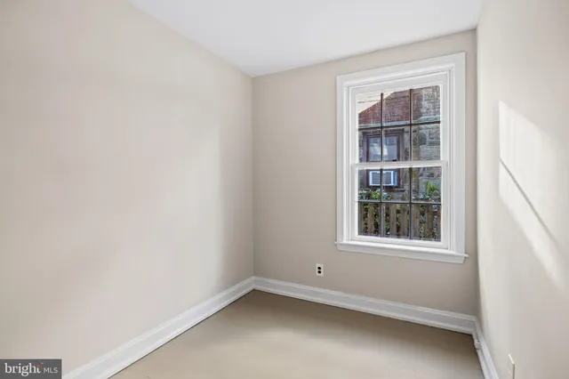 a bathroom with a white bathtub