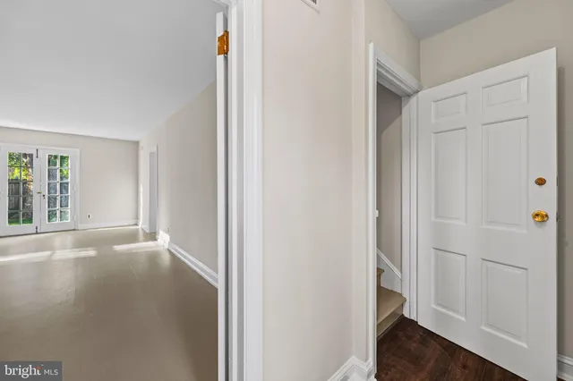 a utility room with a window dryer and main door