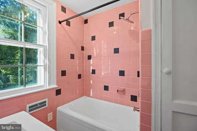 a view of an empty room with stairs