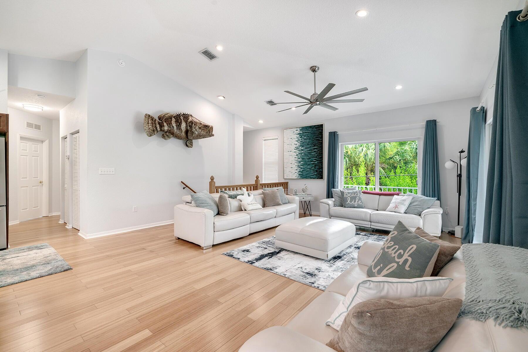 191 Carroll Street Islamorada, FL 33036 - Photo 14 of 40 a living room with furniture and a large window