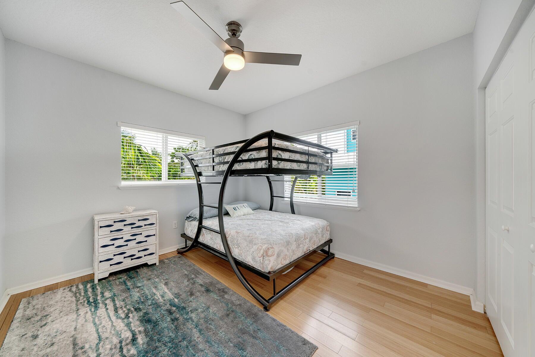 191 Carroll Street Islamorada, FL 33036 - Photo 24 of 40 a living room with a bed furniture and a window