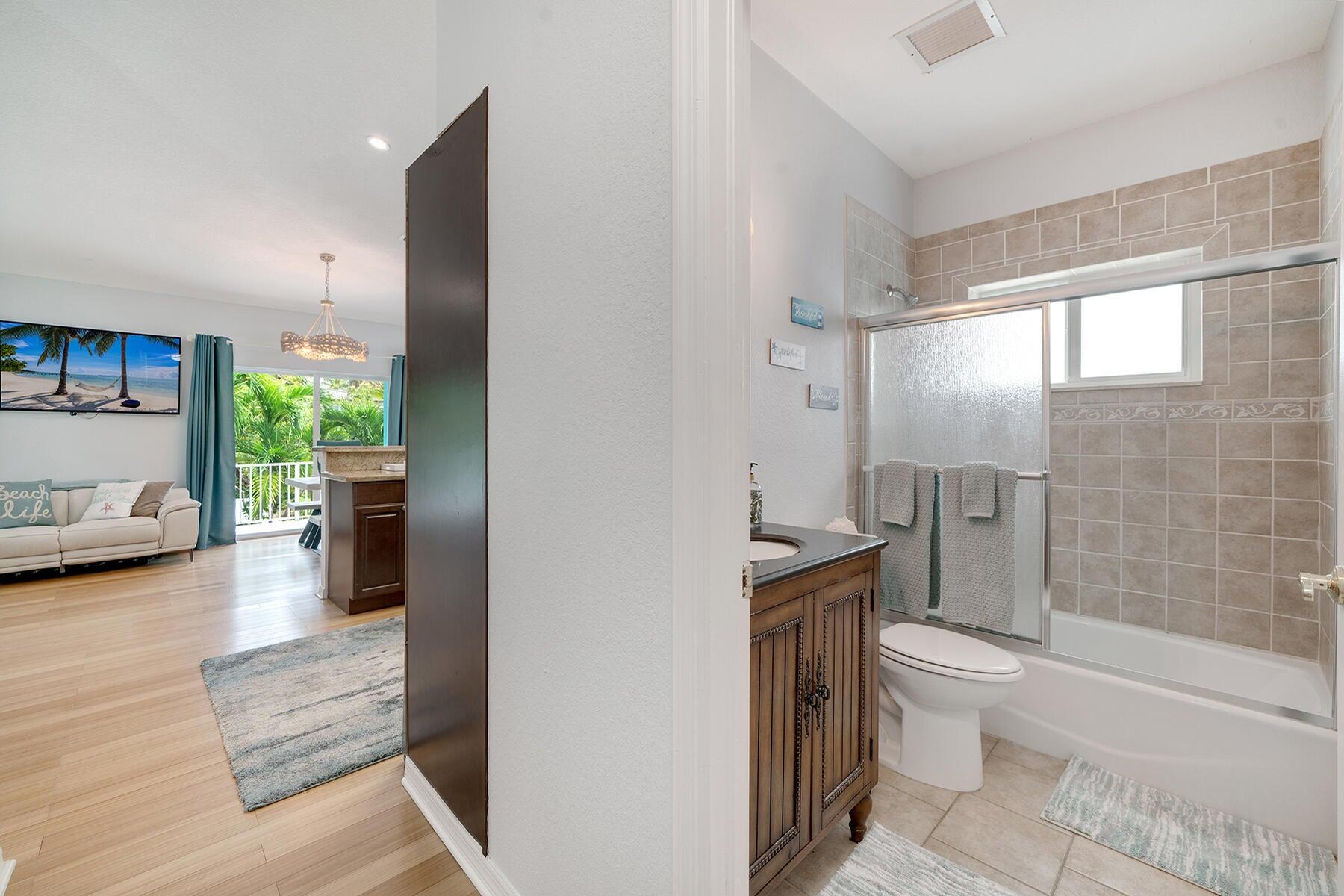 191 Carroll Street Islamorada, FL 33036 - Photo 25 of 40 a bathroom with a sink toilet and shower