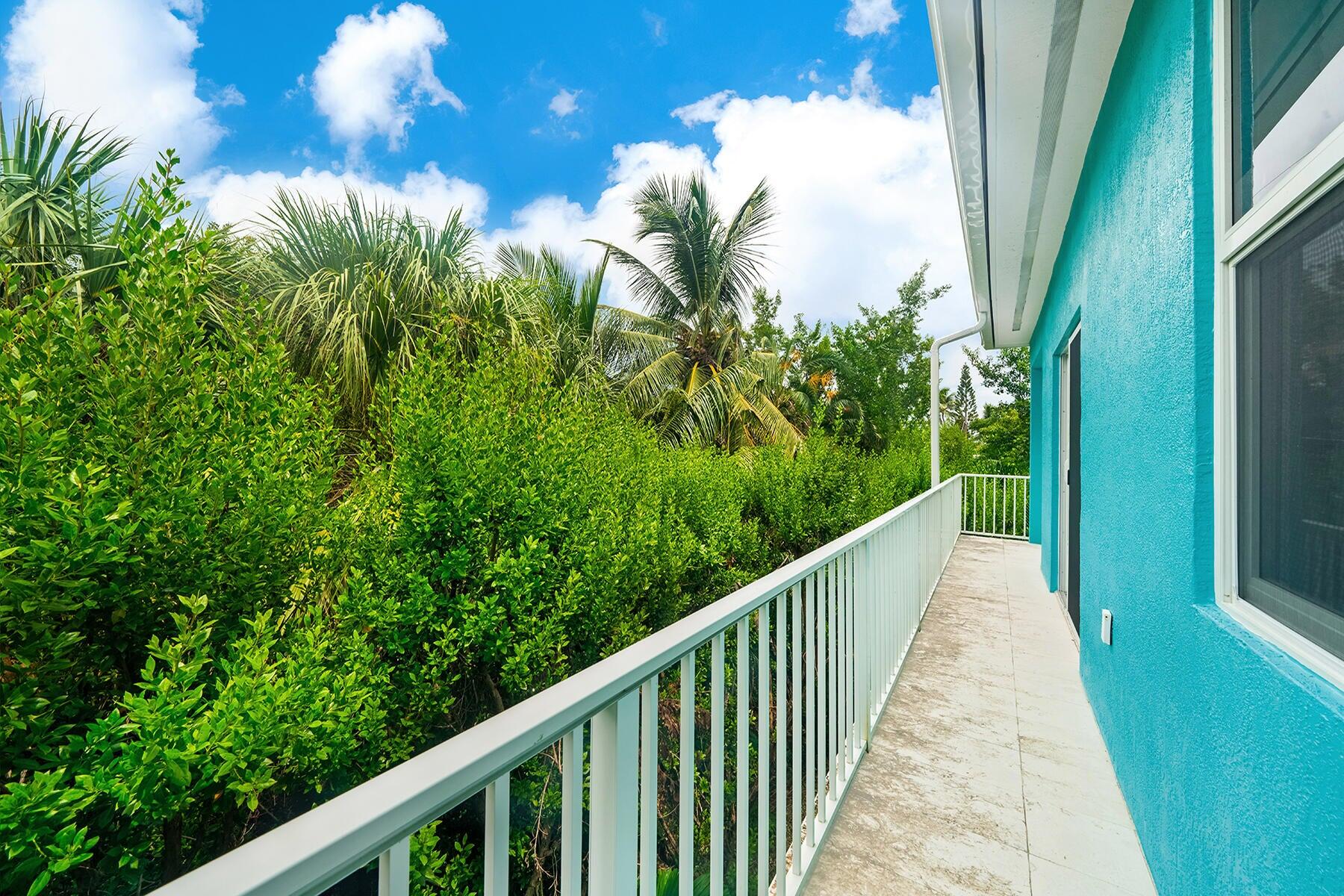 191 Carroll Street Islamorada, FL 33036 - Photo 33 of 40 a view of a balcony with a plant
