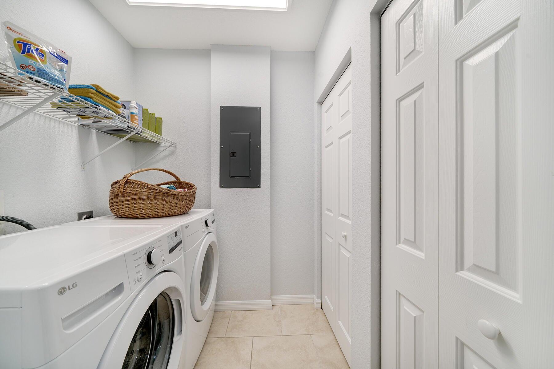 191 Carroll Street Islamorada, FL 33036 - Photo 34 of 40 a utility room with dryer and washer