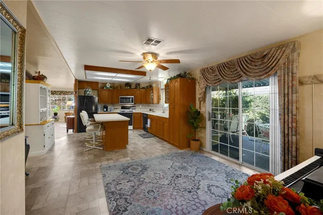 a view of a living room and dining room