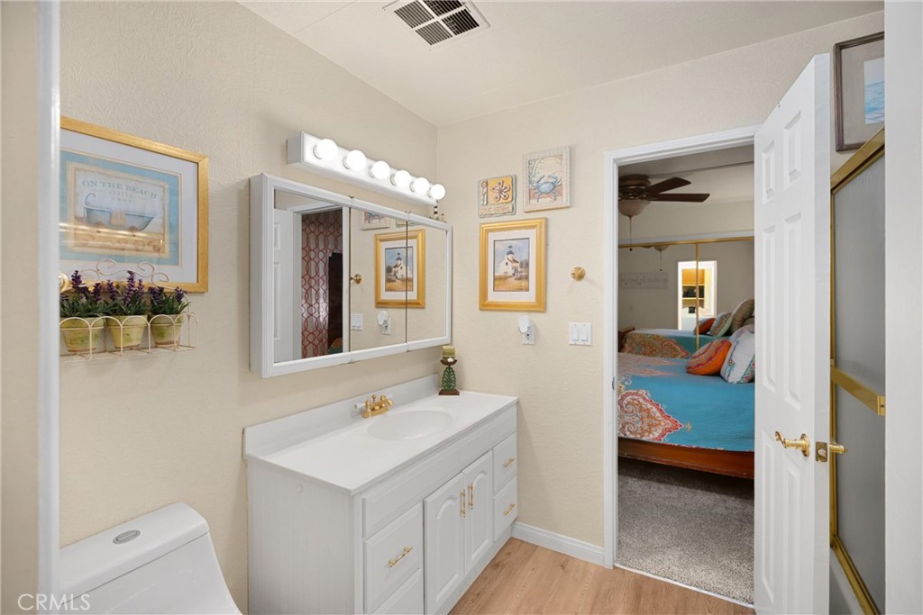 10210 Base Line Road, Unit 235 Rancho Cucamonga, CA 91701 - Photo 21 of 33 a bathroom with a sink and a mirror