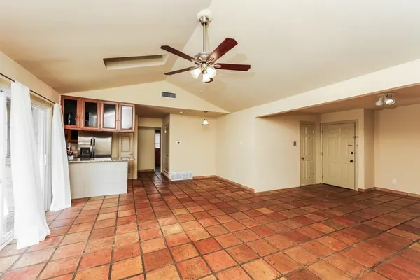 a bedroom with a bed and a walk in closet