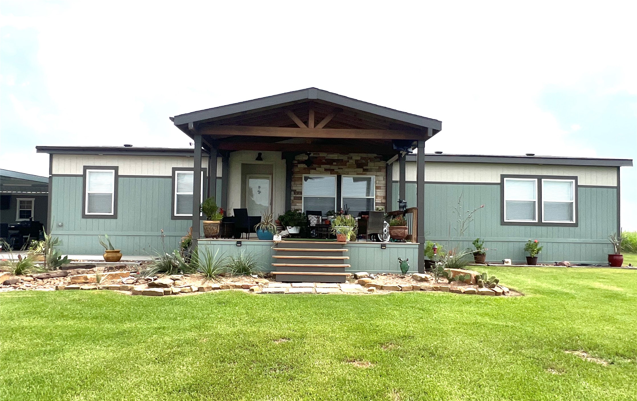 7391 FM 2546 Road El Campo, TX 77437 - Photo 2 of 50 a view of a house with a yard