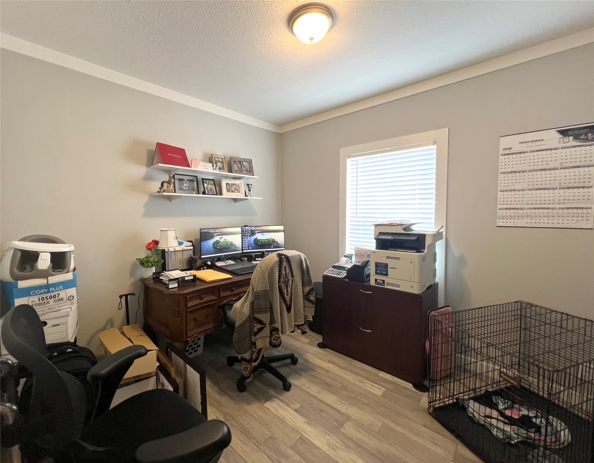 7391 FM 2546 Road El Campo, TX 77437 - Photo 26 of 50 a view of a workspace with furniture and a window