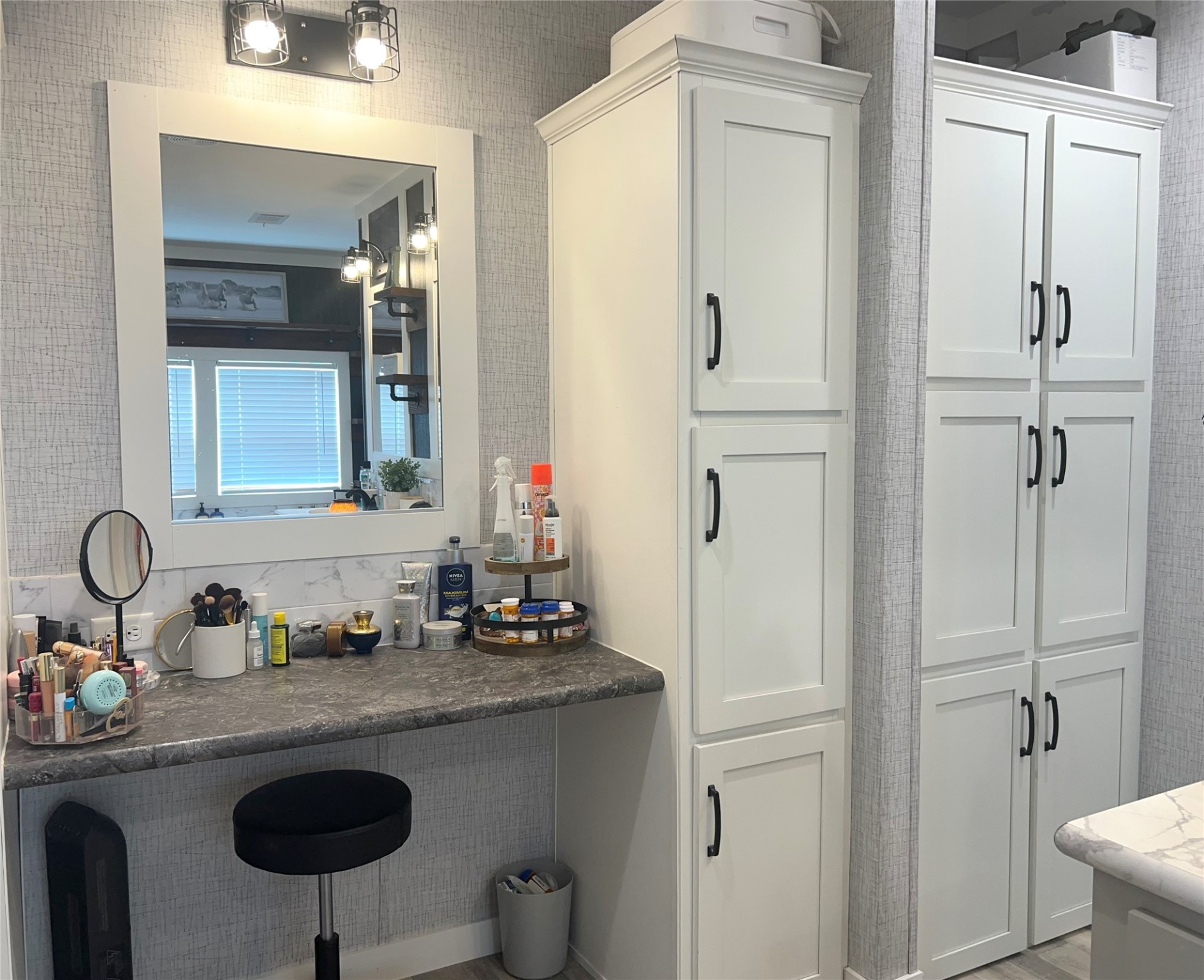 7391 FM 2546 Road El Campo, TX 77437 - Photo 36 of 50 a bathroom with a granite countertop sink and a mirror