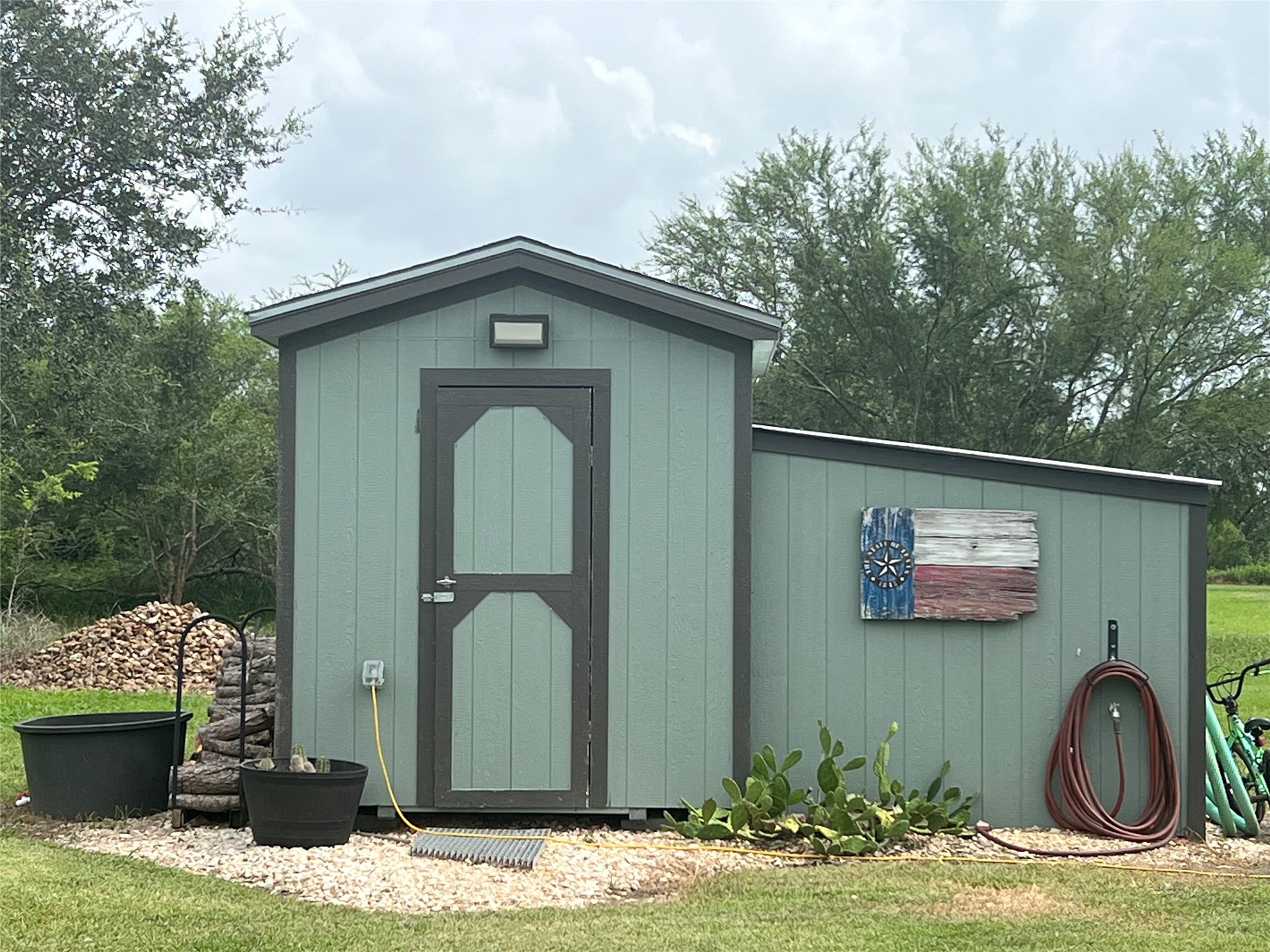 7391 FM 2546 Road El Campo, TX 77437 - Photo 39 of 50 a front view of a house with garden