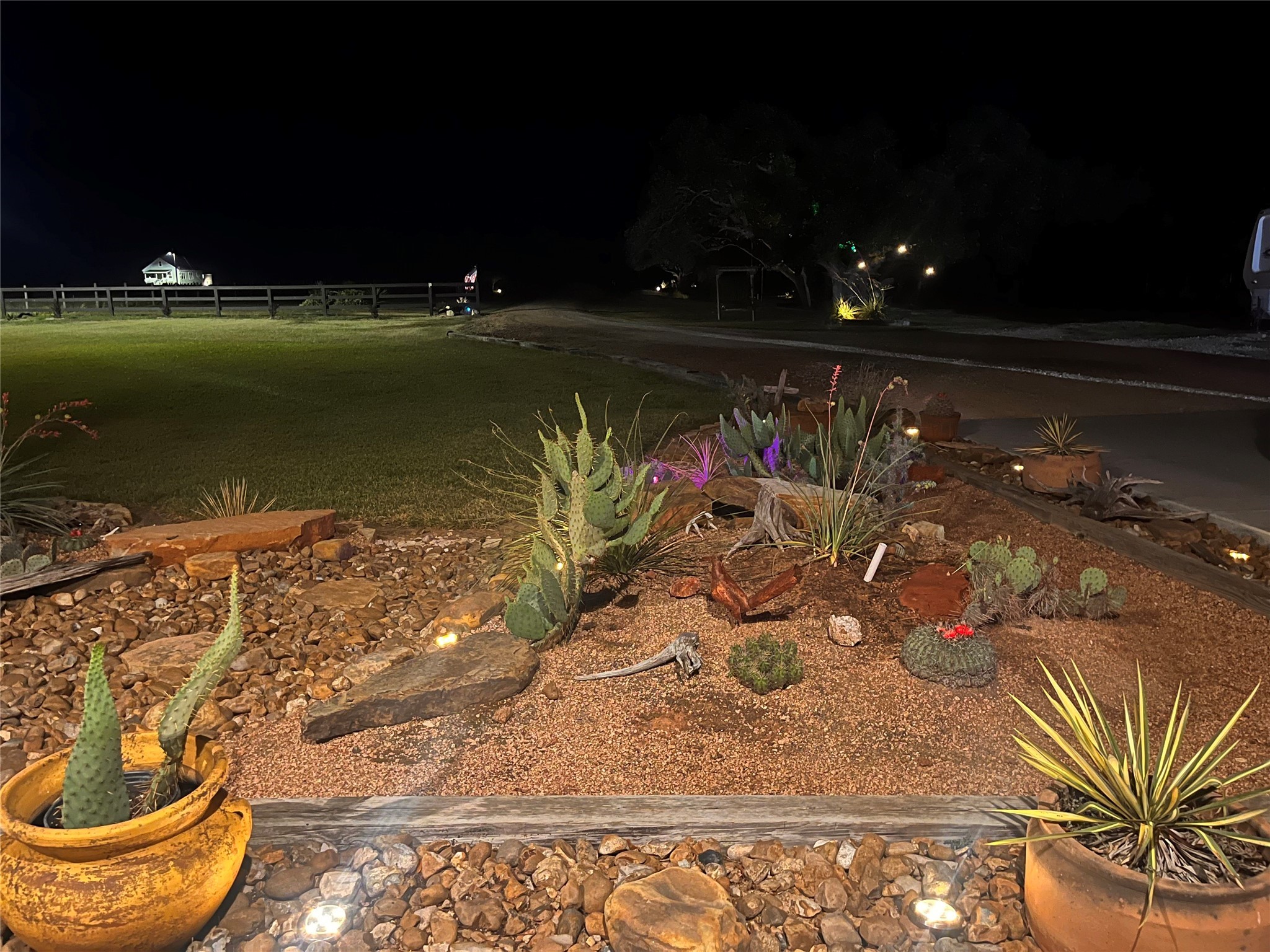 7391 FM 2546 Road El Campo, TX 77437 - Photo 46 of 50 a view of a swimming pool with an outdoor seating and a yard