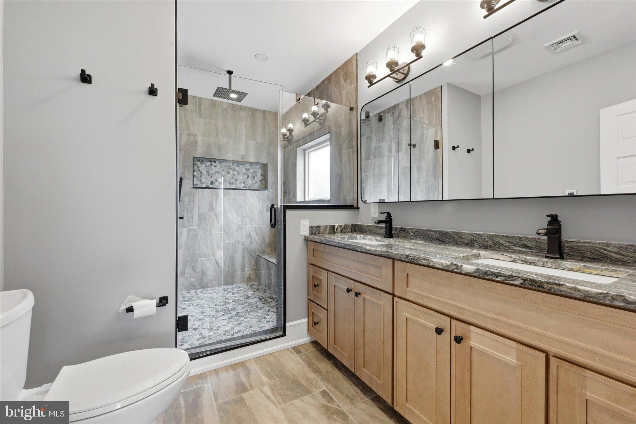 120 Rutledge Avenue Rutledge, PA 19070 - Photo 23 of 35 Sleek modern bathroom with elegant finishes.