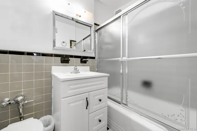 a view of an empty room and fire place