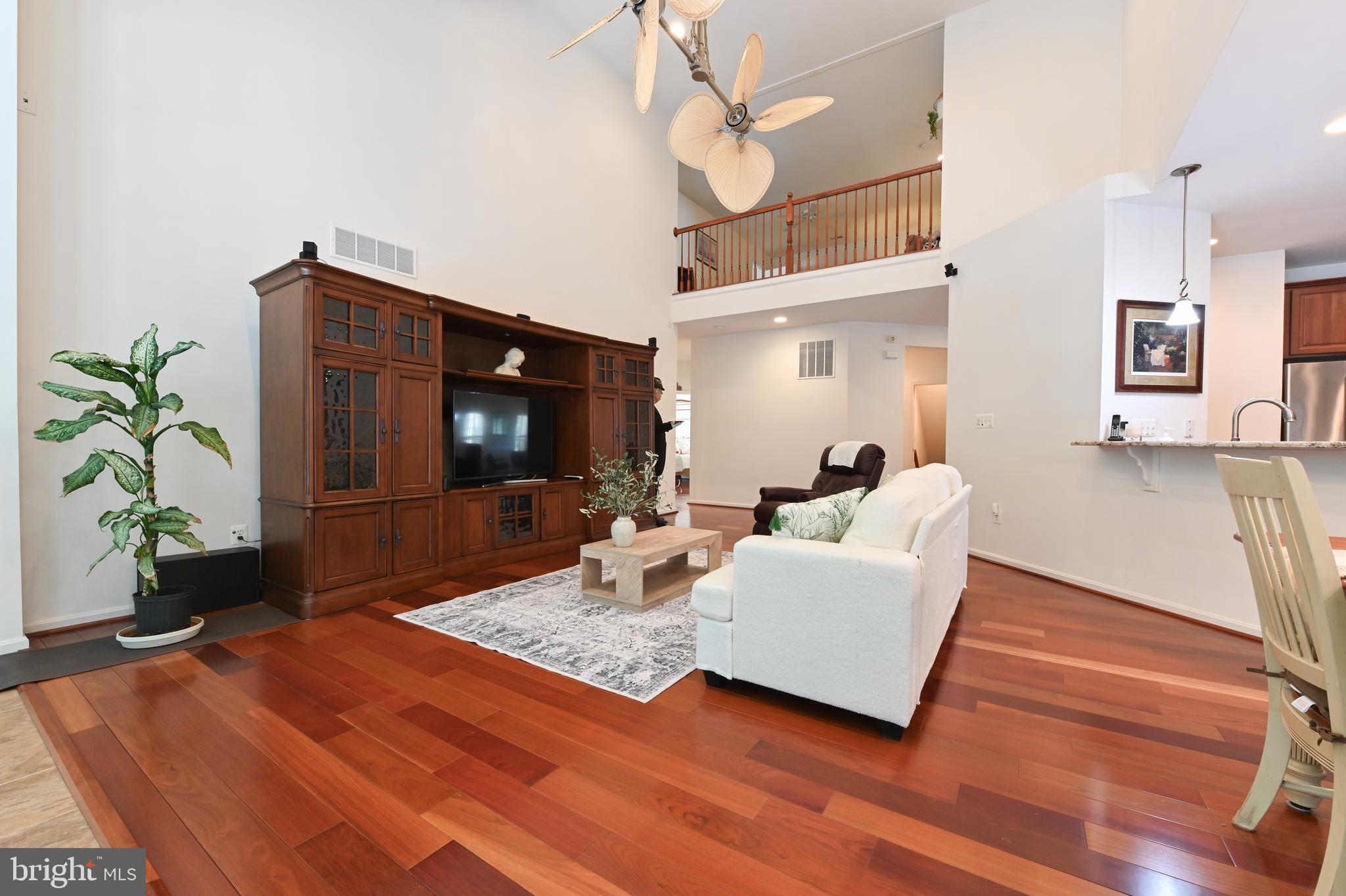 371 Overture Way Centreville, MD 21617 - Photo 14 of 68 a living room with furniture and a flat screen tv