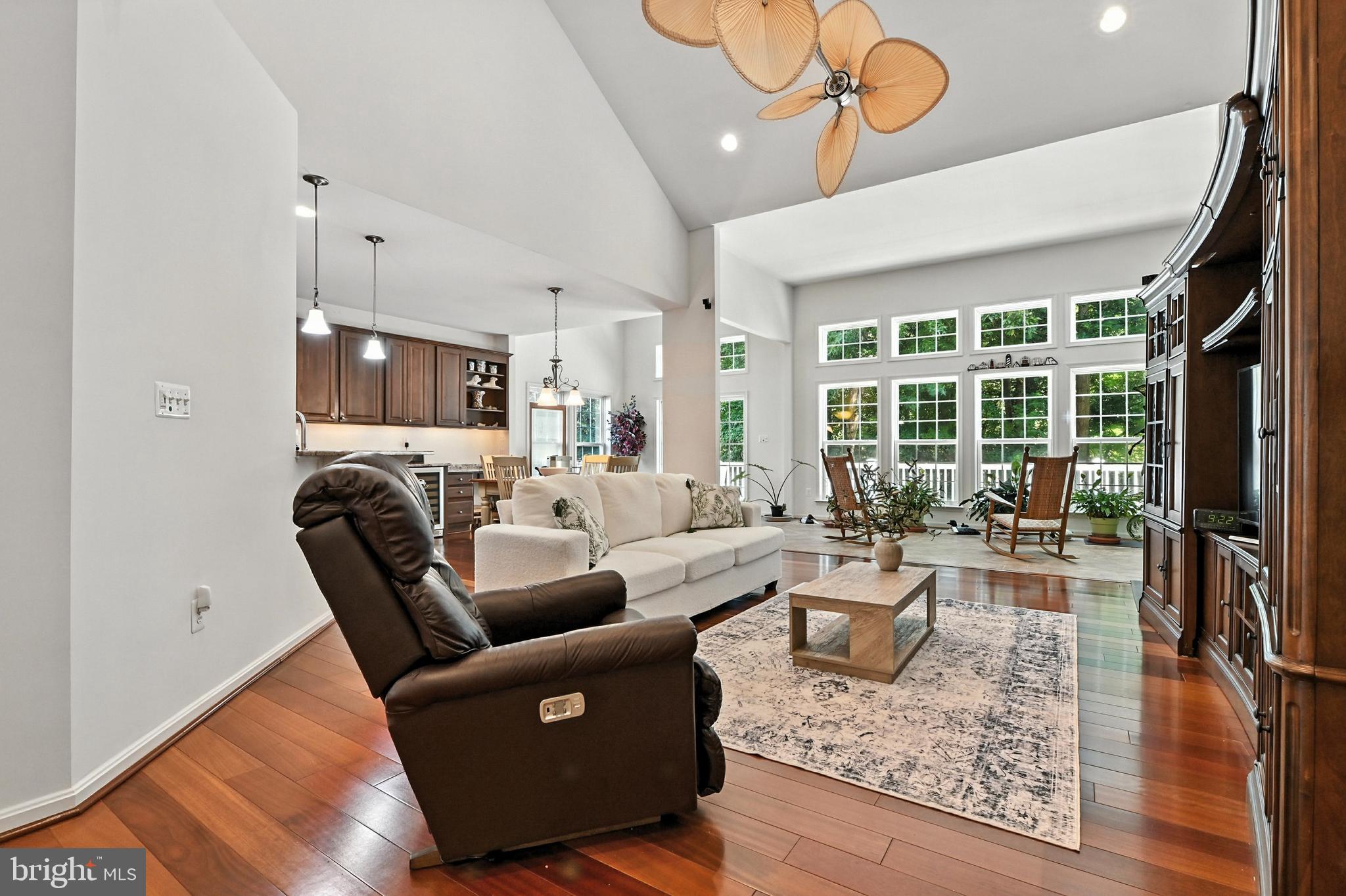 371 Overture Way Centreville, MD 21617 - Photo 15 of 68 a living room with fireplace furniture and a wooden floor