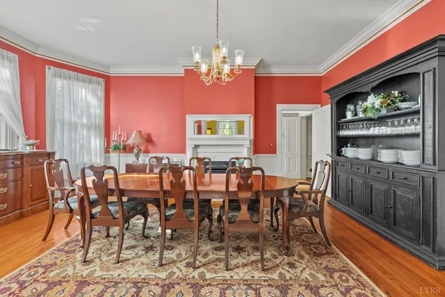 a kitchen with granite countertop a stove sink and cabinets
