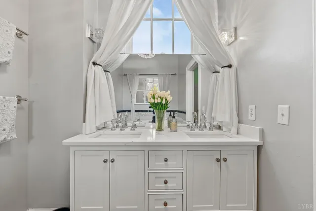 a view of a lake with a house in the background