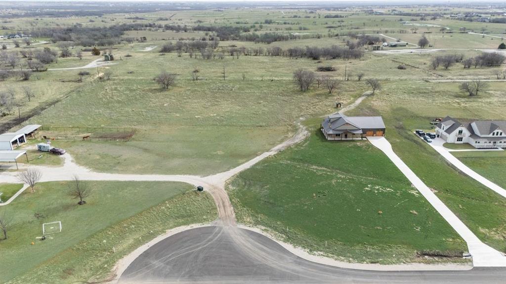 170 Quail Run Court Decatur, TX 76234 - Photo 1 of 4 an aerial view of a house with a yard