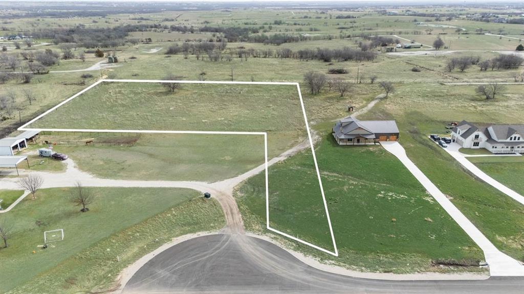 170 Quail Run Court Decatur, TX 76234 - Photo 2 of 4 an aerial view of a football ground