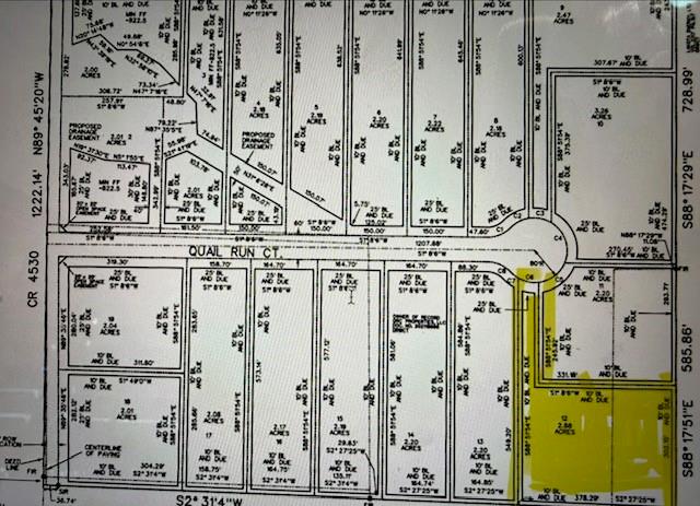 170 Quail Run Court Decatur, TX 76234 - Photo 4 of 4 a view of a city with tall buildings