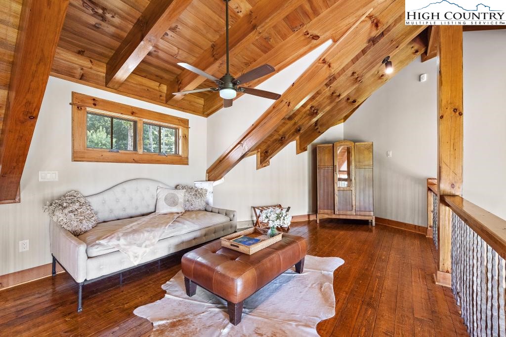 711 Goldenrod Road Boone, NC 28607 - Photo 18 of 49 a living room with furniture and wooden floor