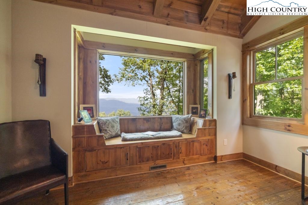 711 Goldenrod Road Boone, NC 28607 - Photo 21 of 49 a living room with furniture and a large window
