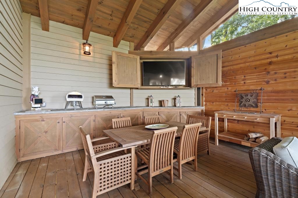 711 Goldenrod Road Boone, NC 28607 - Photo 25 of 49 a kitchen with a sink cabinets and wooden floor