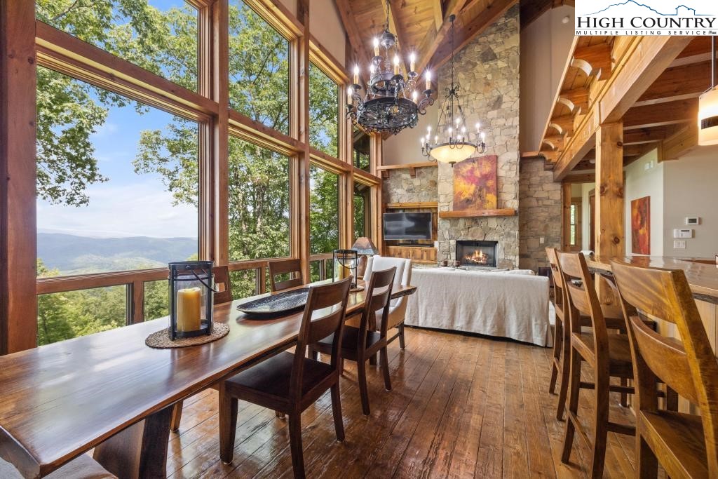 711 Goldenrod Road Boone, NC 28607 - Photo 3 of 49 a view of a dining room with furniture window and outside view