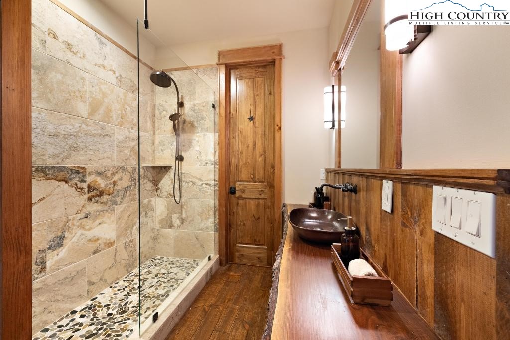 711 Goldenrod Road Boone, NC 28607 - Photo 42 of 49 a walk in closet with wooden floor