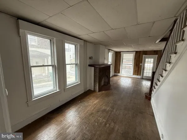 a view of livingroom with hardwood floor and window