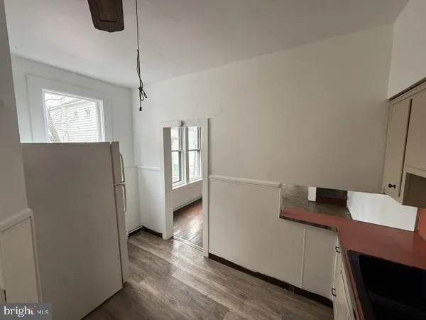 a workspace with furniture and window