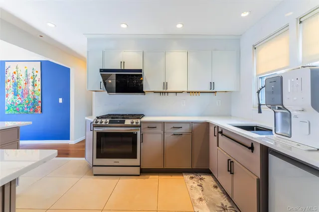 a view interior of a kitchen and stove