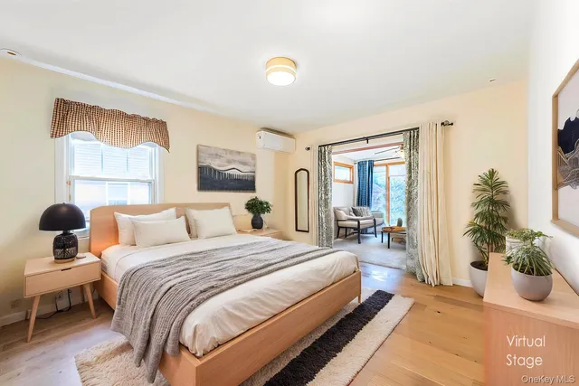 a view of a kitchen and a sink window wooden floor and windows