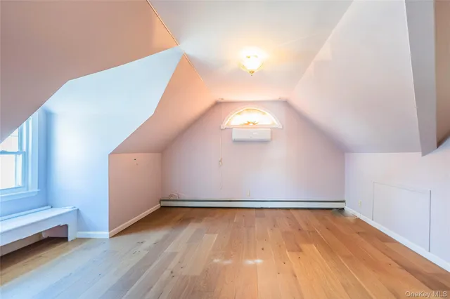 a view of a room with a large window