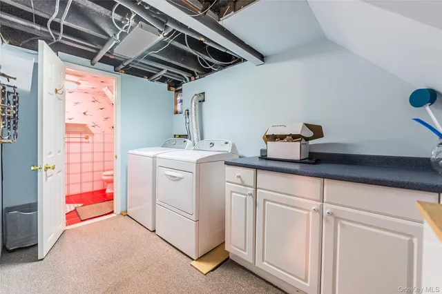 a view of a room with a flat screen tv