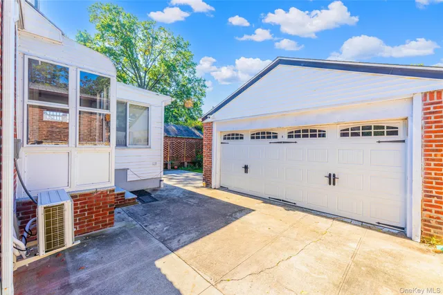 a picture of a room with a white cabinet