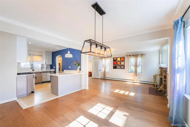 an aerial view of a house with a garden and plants