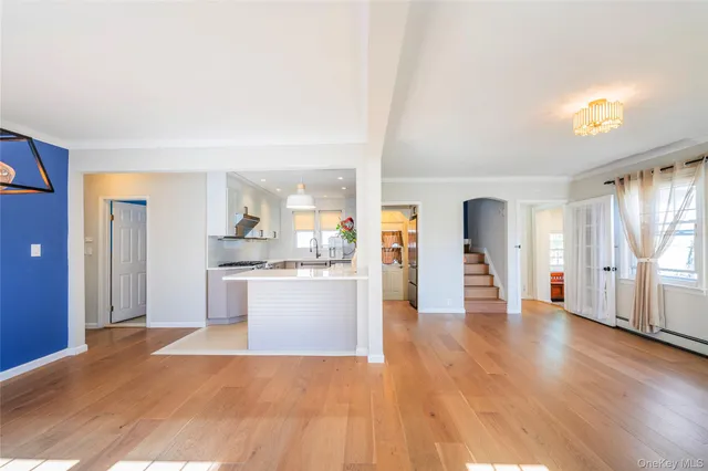aerial view of a house with a yard and plants