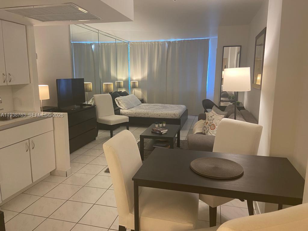 100 Lincoln Road, Unit 314A Miami Beach, FL 33139 - Photo 13 of 40 a living room with furniture