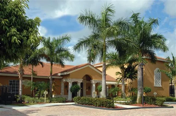 a front view of house with small garden