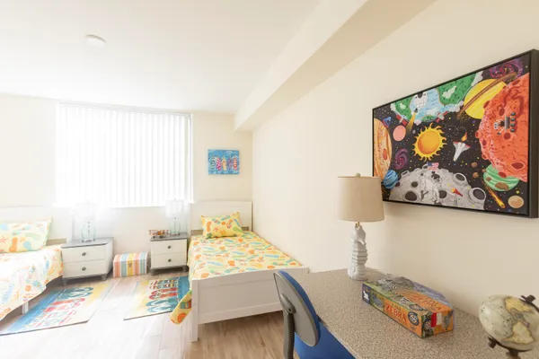 a bedroom with furniture and a bed