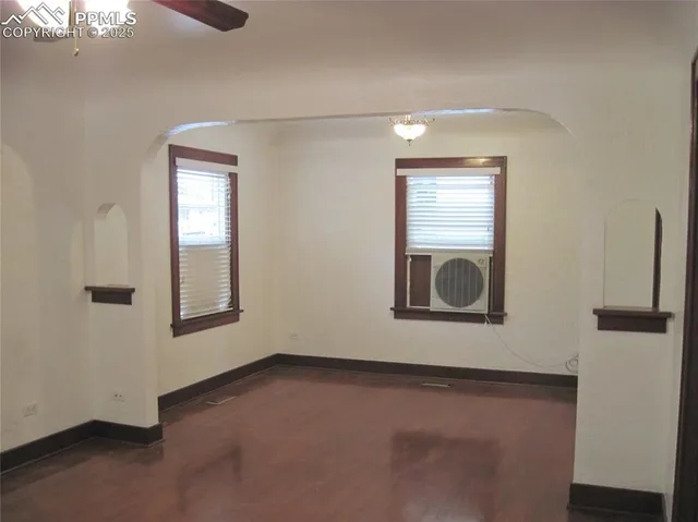 a bathroom with a sink toilet and mirror