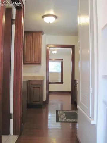 a view of storage and utility room with washer and dryer