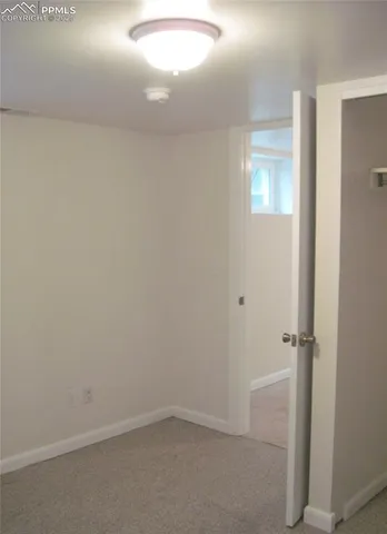 a view of storage and utility room with washer and dryer