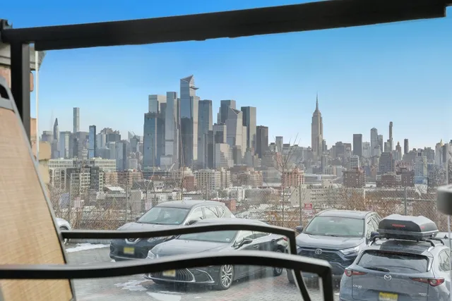 a view of a city view from a balcony