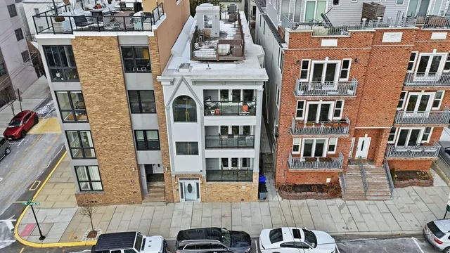 a front view of a building with glass windows