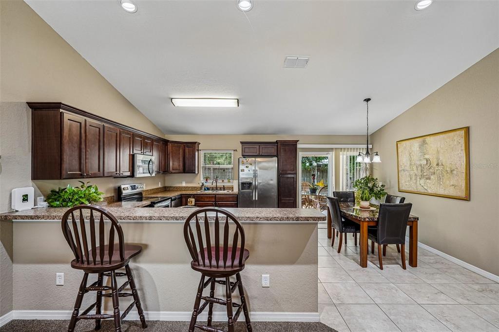 72 Cedar Road Ocala, FL 34472 - Photo 7 of 20 a view of a dining room with furniture