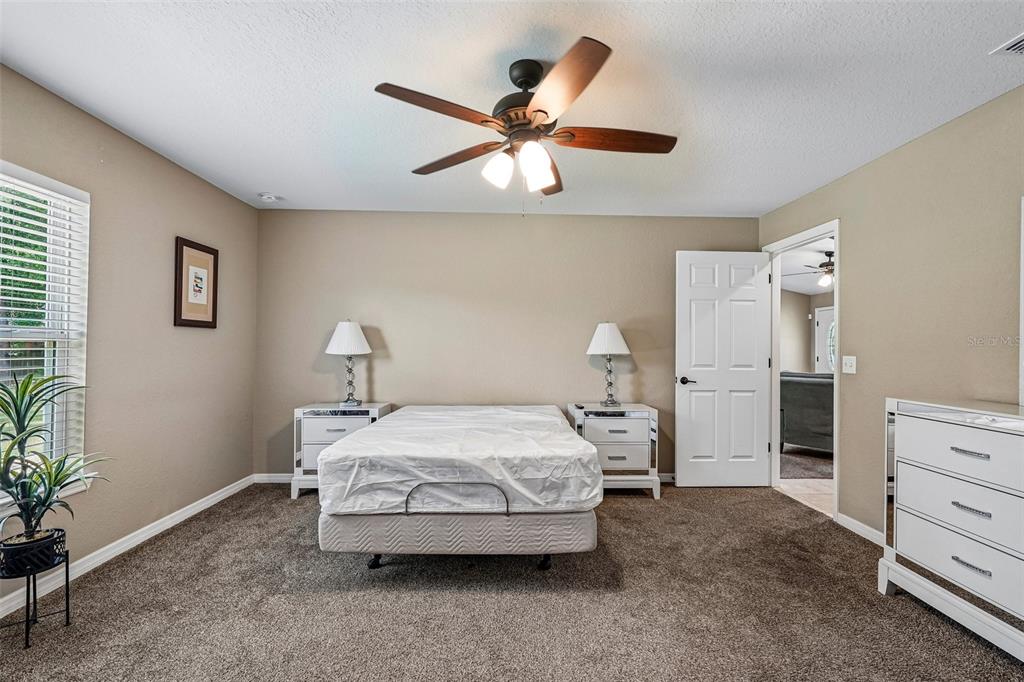 72 Cedar Road Ocala, FL 34472 - Photo 10 of 20 a bedroom with a bed and a table