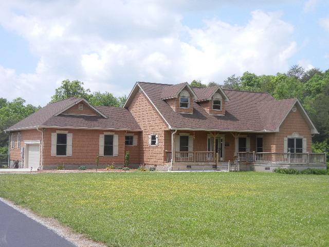 Custom Built in 2008, this home is beautifully decorated inside and out and perfectly situated on a partially wooded lot with a creek ambling through the trees.